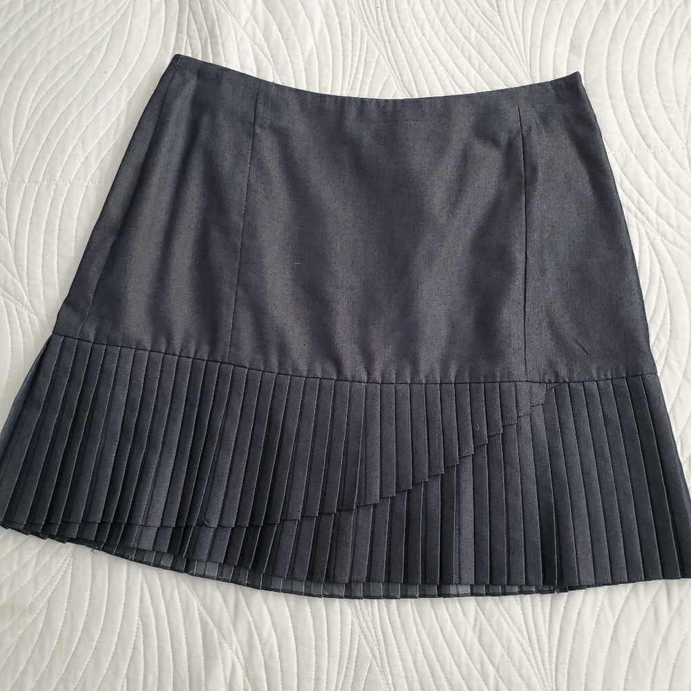 Mini denim pleated skirt.